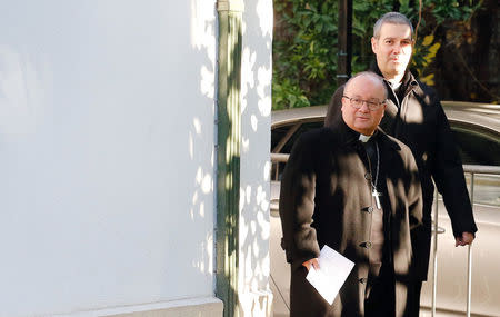 Special Vatican envoys archbishop Charles Scicluna and father Jordi Bertomeu attend a news conference in Santiago, Chile June 12, 2018. REUTERS/Rodrigo Garrido