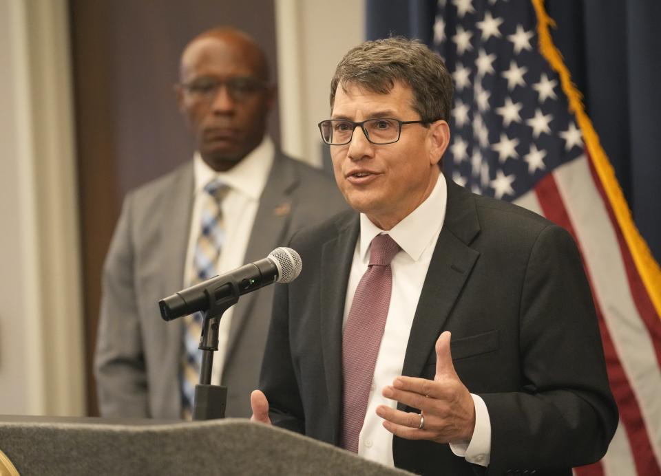 U.S. Attorney Gary M. Restaino along with FBI special agent in charge Akil Davis announce recent developments in criminal cases involving threats against the election community in Arizona in Phoenix on March 25, 2024.