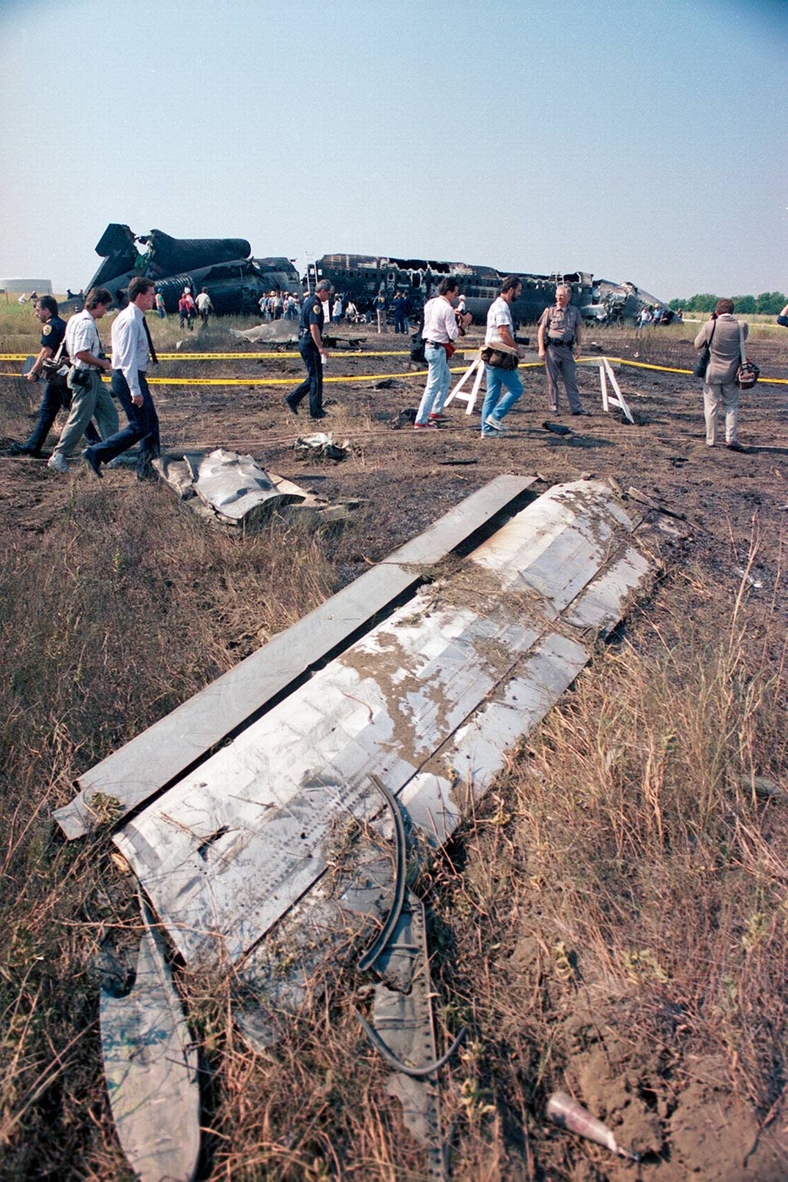 Aug. 31, 1988: What appears to be a piece of the Boeing 727’s wing assembly in the dirt along the path of where Delta 1141 skidded into the grass after a failed takeoff at Dallas-Fort Worth International Airport.
