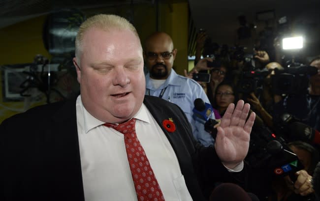 Mayor Rob Ford talks to media at City Hall in Toronto on Thursday, Oct. 31, 2013. Ford says he has no reason to step down despite police confirmation that they have seized a video media have alleged appears to show him smoking crack cocaine. THE CANADIAN PRESS/Frank Gunn