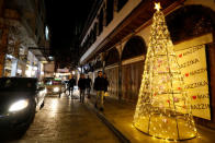 People walk along a street in the ancient quarter of Bab-Sharqi in Damascus, Syria December 15, 2018. Picture taken December 15, 2018. REUTERS/Omar Sanadiki