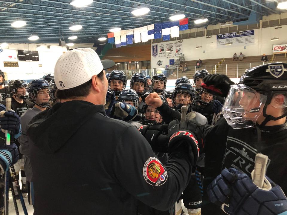 Peoria Rivermen head coach, ex-NHLer and Tru Academy hockey school founder Jean-Guy Trudel delivers instruction to camp participants during a session at Owens Center late Monday, July 24, 2023.