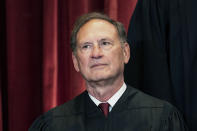 FILE - Associate Justice Samuel Alito sits during a group photo at the Supreme Court in Washington, Friday, April 23, 2021. The Supreme Court's sweeping rulings on guns and abortion were the latest and perhaps clearest manifestation of how the court has evolved over the past six years, a product of historical accident and Republican political brute force, from an institution that leaned right, but produced some notable liberal victories, to one with an aggressive, 6-3 conservative majority. (Erin Schaff/The New York Times via AP, Pool)