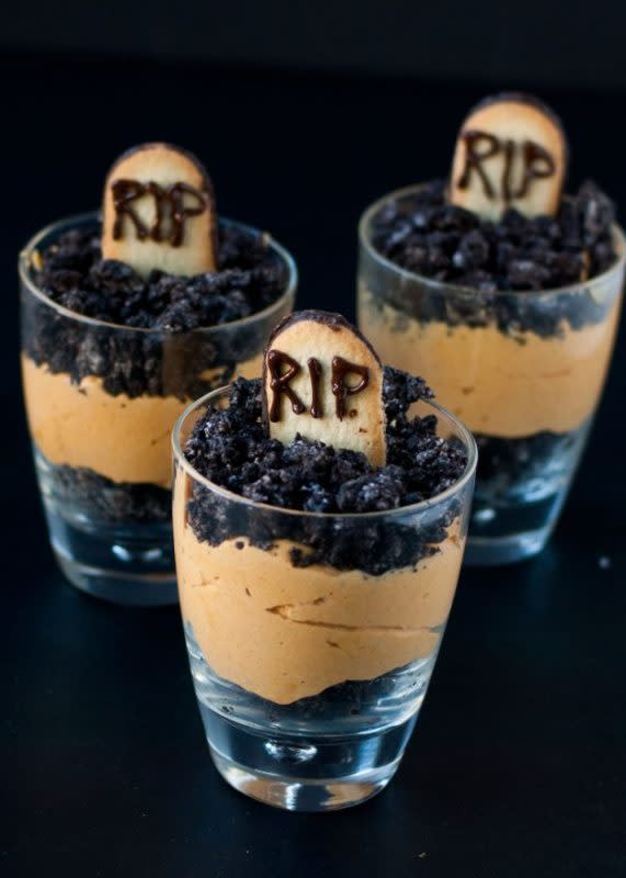 <p>Neighbor Food</p><p>Liven up your snack table with this yummy parfait recipe from <a href="https://neighborfoodblog.com/2013/10/pumpkin-dirt-pudding-graveyard-parfaits.html" rel="nofollow noopener" target="_blank" data-ylk="slk:Neighbor Food;elm:context_link;itc:0;sec:content-canvas" class="link rapid-noclick-resp">Neighbor Food</a>! Who would have thought Milano cookies make such great tombstones? </p>