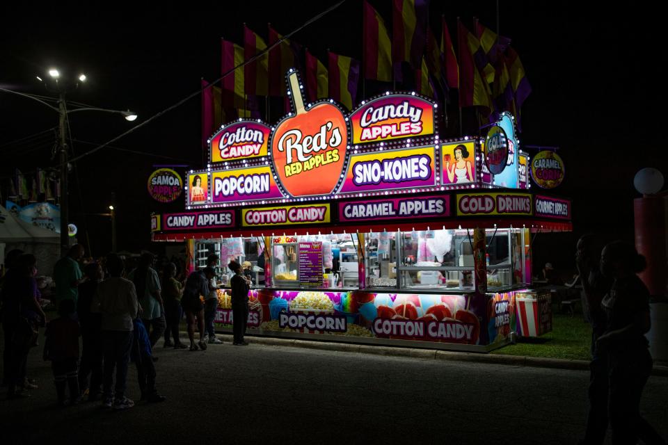 Tallahasseeans line up to get their fair food fix during the Carnival Food Fair at the North Florida Fairgrounds on Friday, Nov. 6, 2020.