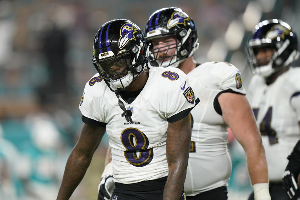 Baltimore Ravens quarterback Lamar Jackson (8) reacts after being sacked during the first half of an NFL football game against the Miami Dolphins, Thursday, Nov. 11, 2021, in Miami Gardens, Fla. (AP Photo/Lynne Sladky)