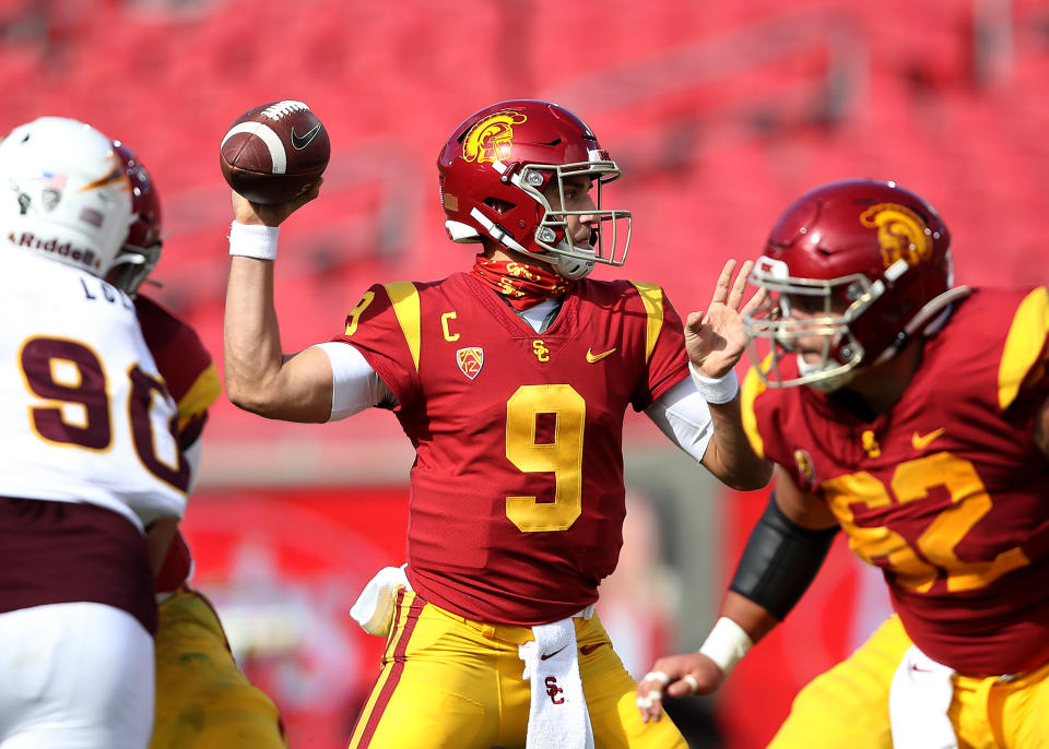 LOS ANGELES, CALIFORNIA - NOVEMBER 07:  Kedon Slovis #9 of the USC Trojans makes a pass against the Arizona State Sun Devils during the first half of a game at Los Angeles Coliseum on November 07, 2020 in Los Angeles, California. (Photo by Sean M. Haffey/Getty Images)