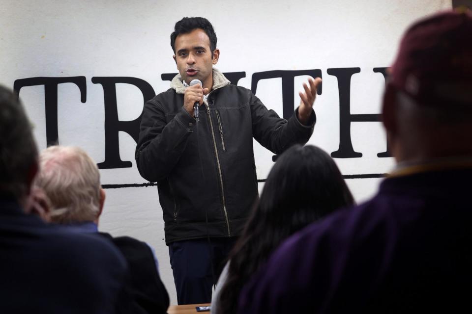 PHOTO: Republican presidential candidate businessman Vivek Ramaswamy speaks to guests during a campaign stop at the AmericInn on December 19, 2023 in Webster City, Iowa. (Scott Olson/Getty Images)