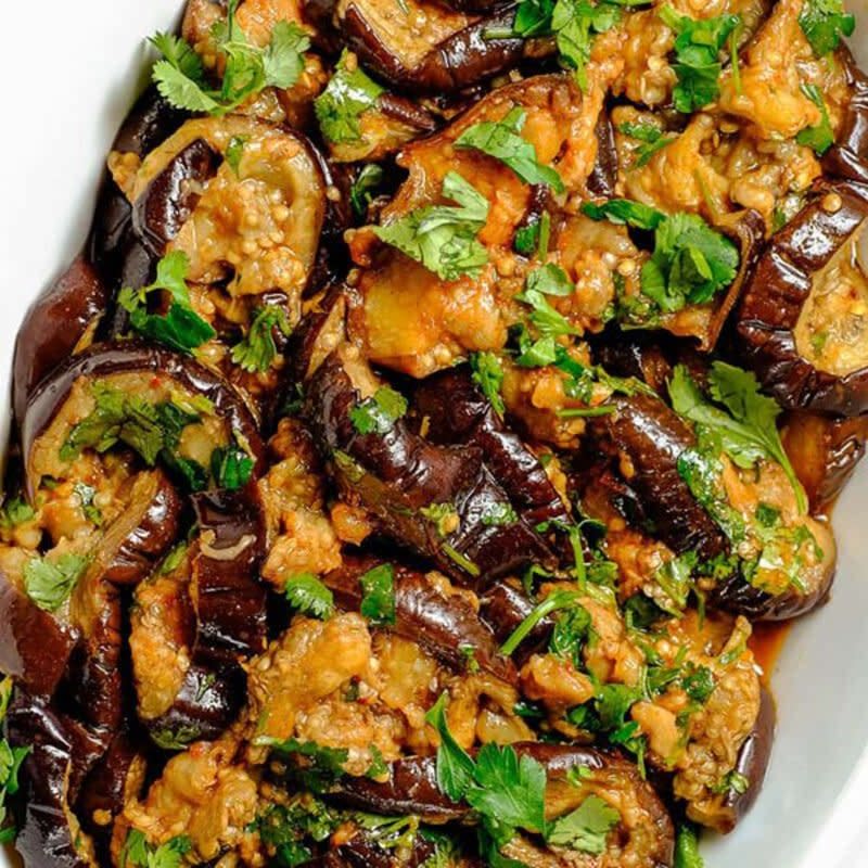 <p>Moroccan eggplant salad smothered in chermoula is a stunningly lip-smacking salad. The eggplant is creamy, fork-tender and packed with flavorful herbs and spices. It is low in calories and yet is a pretty good source of phytochemicals and other nutrients.</p><p><strong>Get the recipe: <a href="https://www.thedeliciouscrescent.com/baked-eggplant-salad-with-chermoula/" rel="nofollow noopener" target="_blank" data-ylk="slk:Moroccan Eggplant Salad with Chermoula;elm:context_link;itc:0;sec:content-canvas" class="link ">Moroccan Eggplant Salad with Chermoula</a></strong></p>