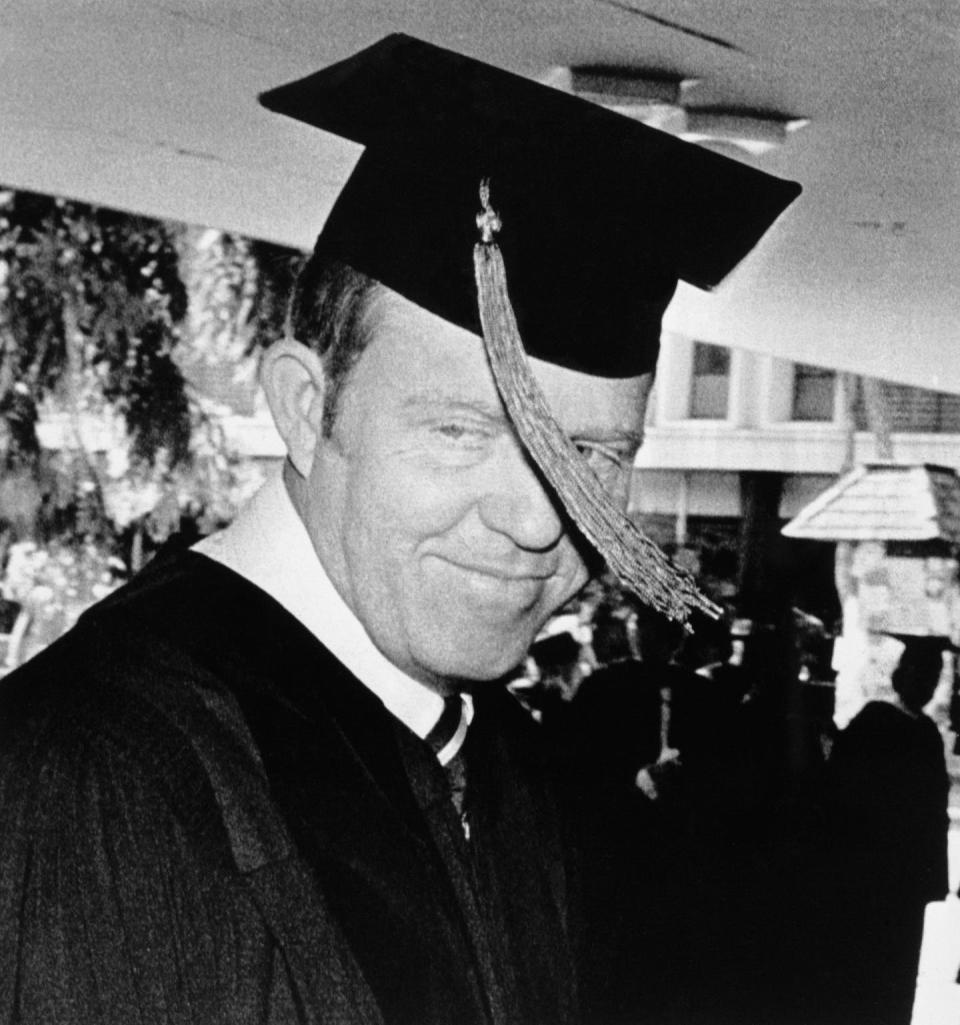 Allan Bakke, 42, receives his medical diploma in 1982 after successfully challenging affirmative action admissions policies to the Supreme Court. <a href="https://www.gettyimages.com/detail/news-photo/allan-bakke-enters-freeborn-hall-to-receive-his-medical-news-photo/1096096308?phrase=allan%20bakke&adppopup=true" rel="nofollow noopener" target="_blank" data-ylk="slk:Bettmann Archive/Getty Images;elm:context_link;itc:0;sec:content-canvas" class="link ">Bettmann Archive/Getty Images</a>