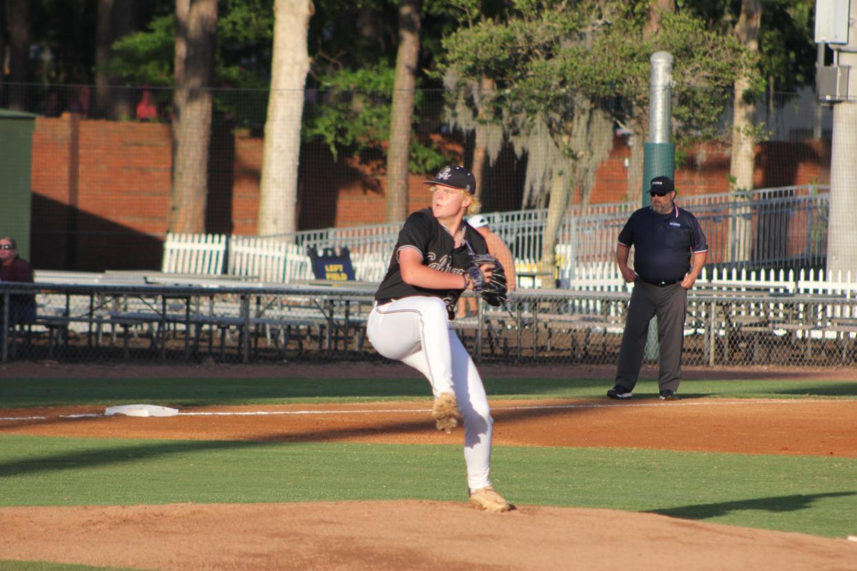 Calvary Day's Quinn Johnson delivers a pitch in a playoff win over Morgan County on April 29, 2024.