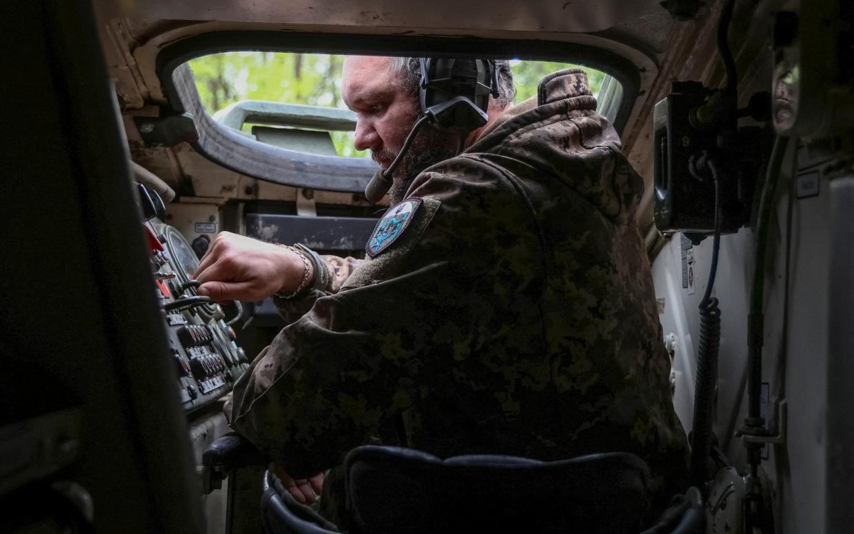 A Ukrainian serviceman of the 25th Separate Airborne Brigade of the Armed Forces of Ukraine, operates a Marder infantry fighting vehicle near a front line, amid Russia's attack on Ukraine, in Donetsk region, Ukraine April 29, 2024