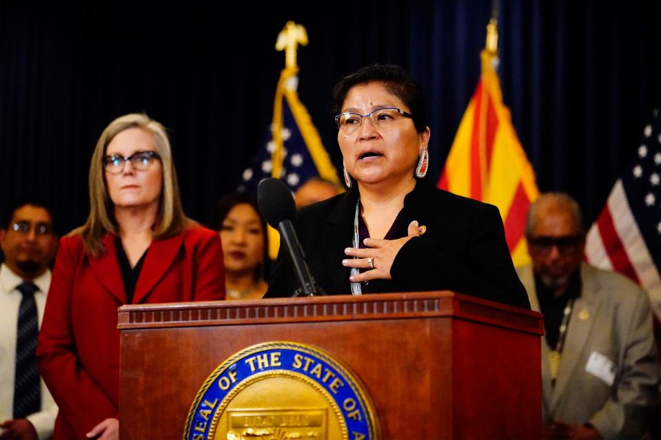 Theresa Hatathlie, state senator (District 6), reacts to actions Arizona is taking to stop fraud against the Medicaid system and exploitation of AHCCCS members during a news conference at the Arizona state Capitol in Phoenix on May 16, 2023.