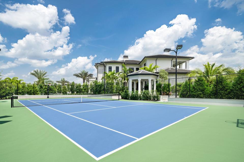 A championship-sized tennis court is perfect for outdoor activities.