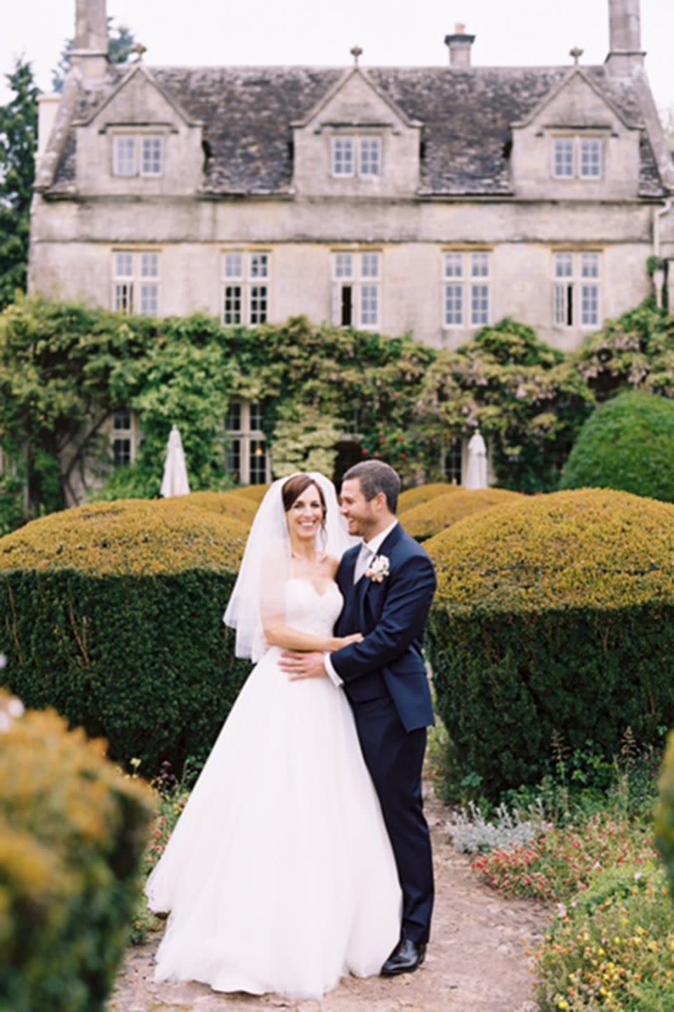 <p><strong>Wedding dress and veil:</strong> Suzanne Neville</p><p><strong>Shoes:</strong> Jimmy Choo</p><p><strong>Headband:</strong> Jenny Packham</p>