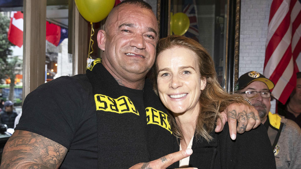 Shane Martin, pictured here with actress Rachel Griffiths in New Zealand after the Richmond Tigers won the AFL grand final in 2019.