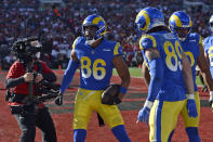Los Angeles Rams tight end Kendall Blanton (86) celebrates his 7-yard touchdown reception against the Tampa Bay Buccaneers during the first half of an NFL divisional round playoff football game Sunday, Jan. 23, 2022, in Tampa, Fla. (AP Photo/Jason Behnken)