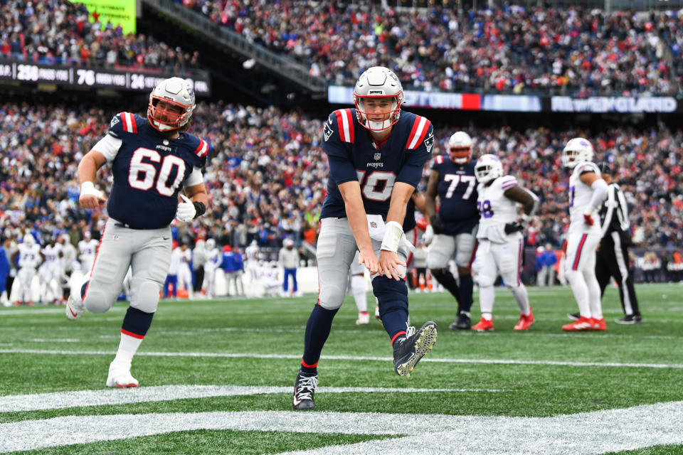 FOXBORO, MA - OCTOBER 22: Mac Jones #10 of the New England Patriots celebrates after the game winning touchdown is scored against the Buffalo Bills at Gillette Stadium on October 22, 2023 in Foxboro, Massachusetts. (Photo by Kathryn Riley/Getty Images)