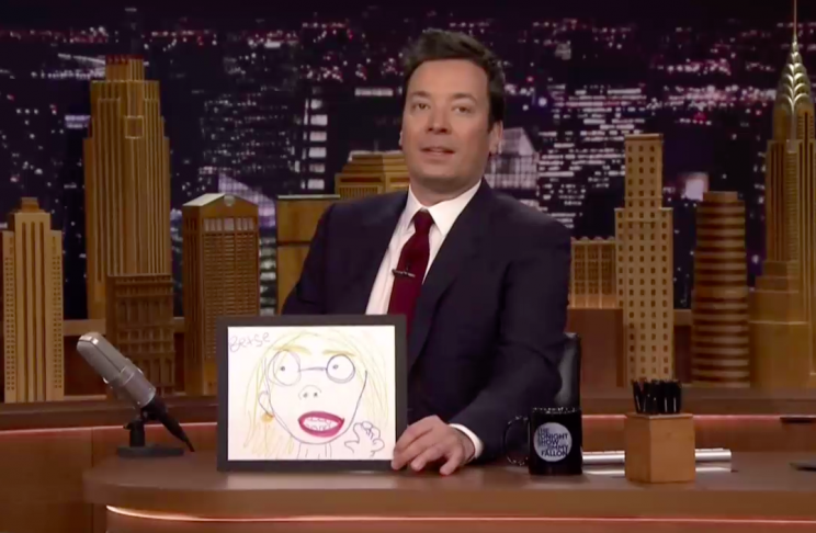 Jimmy Fallon holds a child’s drawing of Education Secretary Betsy DeVos. (Photo: NBC)