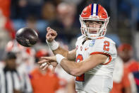 Clemson quarterback Cade Klubnik fumbles the football in the second half during the Atlantic Coast Conference championship NCAA college football game against North Carolina on Saturday, Dec. 3, 2022, in Charlotte, N.C. (AP Photo/Jacob Kupferman)