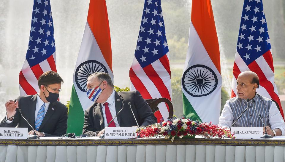 Minister Rajnath Singh (R), U.S. Secretary of State Mike Pompeo (2L) and Secretary of Defence Mark Esper (L) during a press statement, at Hyderabad House in New Delhi, Tuesday, 27 October.