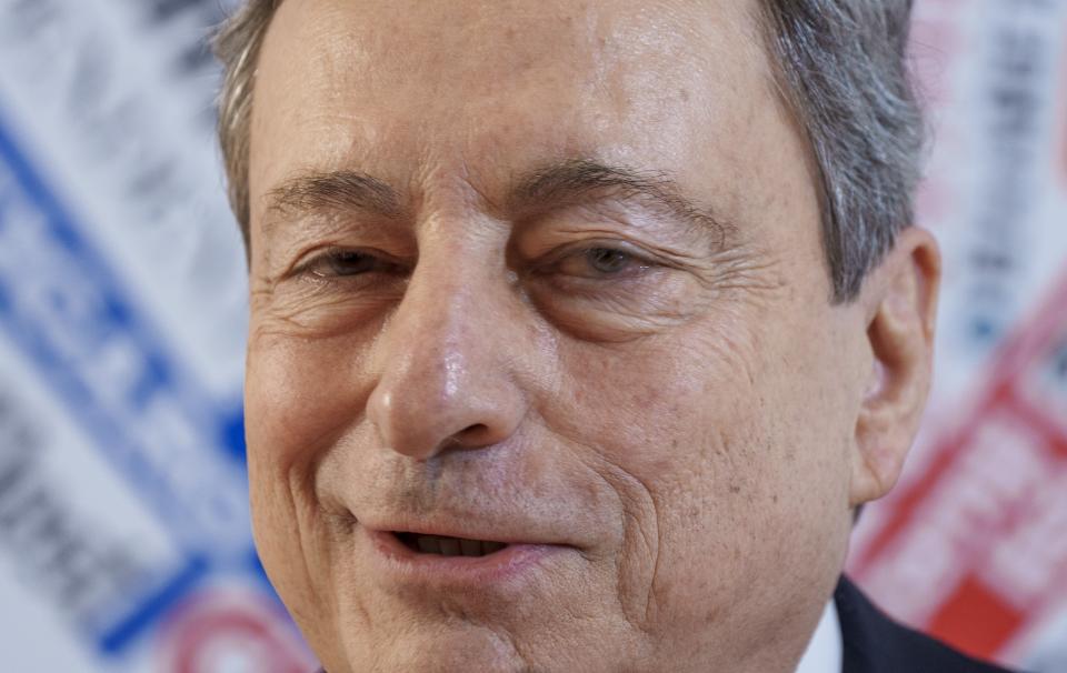 Italian Premier Mario Draghi attends a press conference at the Foreign Press Club in Rome, Thursday, March 31, 2022. Draghi said that the Russian president told him during a 40-minute phone call Wednesday evening that European companies can continue to pay for existing energy contracts in euros and dollars. (AP Photo/Domenico Stinellis)