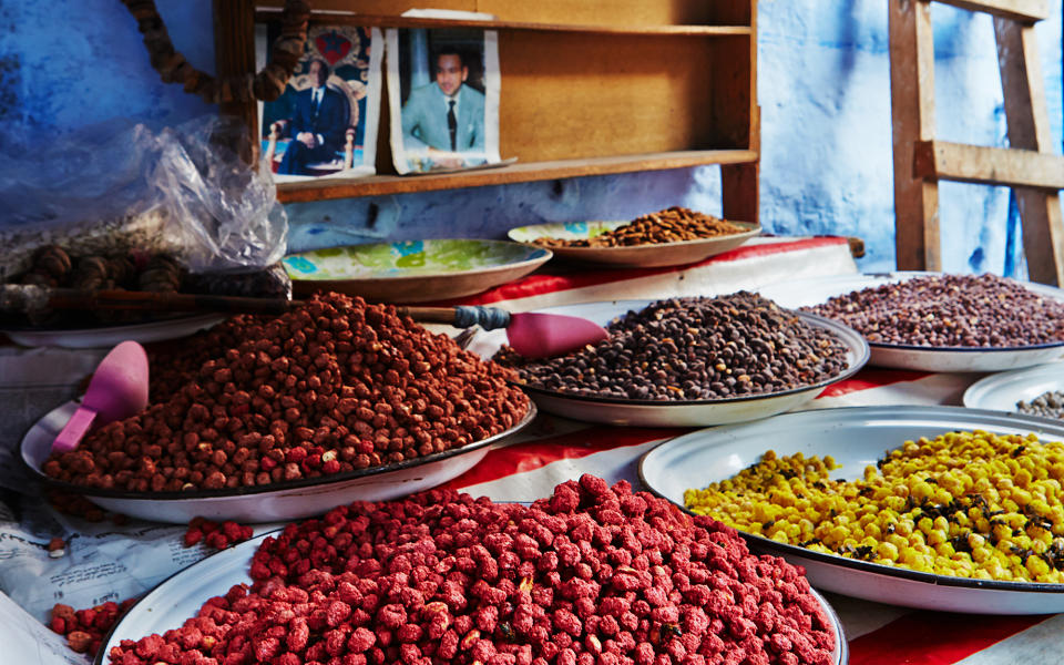 <p>Dried nuts, raisins, and figs are sold at small food stands throughout the medina.</p>