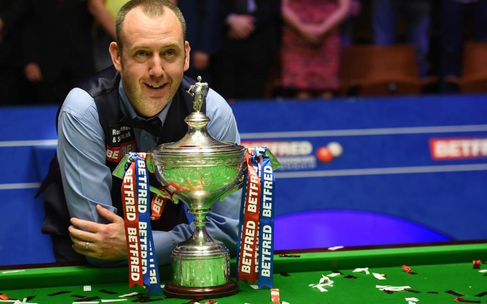 Mark Williams, 43, is the oldest champion since Ray Reardon lifted the trophy in 1978 - AFP