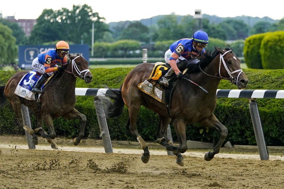 Mo Donegal (6), with jockey Irad Ortiz Jr., pulls away from Nest (3), with Jose Ortiz, before crossing the finish line to win the 154th running of the Belmont Stakes horse race, Saturday, June 11, 2022, at Belmont Park in Elmont, N.Y. (AP Photo/Frank Franklin II)