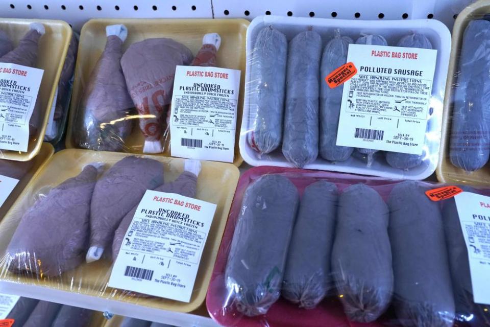 Packaged chicken drumsticks and sausages made out of plastic on display at The Plastic Bag Store in Adelaide’s Rundle Mall.