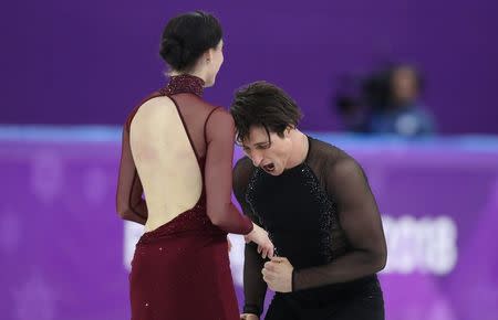 Figure Skating - Pyeongchang 2018 Winter Olympics - Ice Dance free dance competition final - Gangneung, South Korea - February 20, 2018 - Tessa Virtue and Scott Moir of Canada react after their performance. REUTERS/Lucy Nicholson