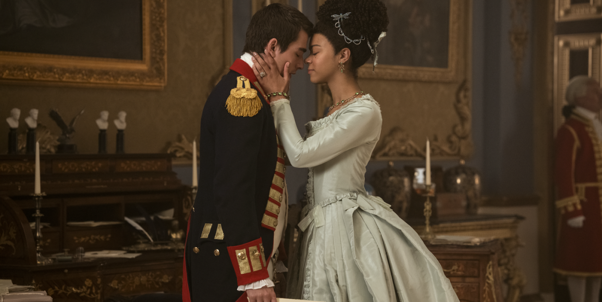 corey mylchreest as young king george and india amarteifio as young queen charlotte embracing in episode 106 of queen charlotte