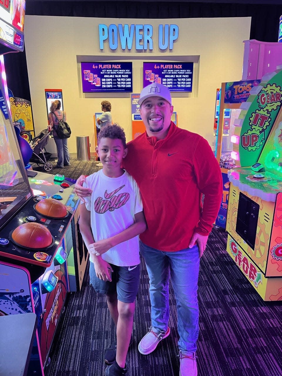 Jamal Johnson of Dover, right, is matched with Crimson, 9, through Big Brothers Big Sisters of East Central Ohio. Johnson was once mentored himself by a woman named Sally Barnett, who now lives in Zanesville.