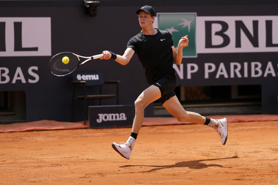 Italy's Jannik Sinner returns the ball to Australia's Thanasi Kokkinakis during their match at the Italian Open tennis tournament, in Rome, Friday, May 12, 2023. (AP Photo/Andrew Medichini)