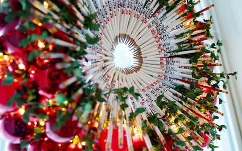 A wreath made from pencils stamped with the Be Best logo - Credit: LEAH MILLIS/REUTERS