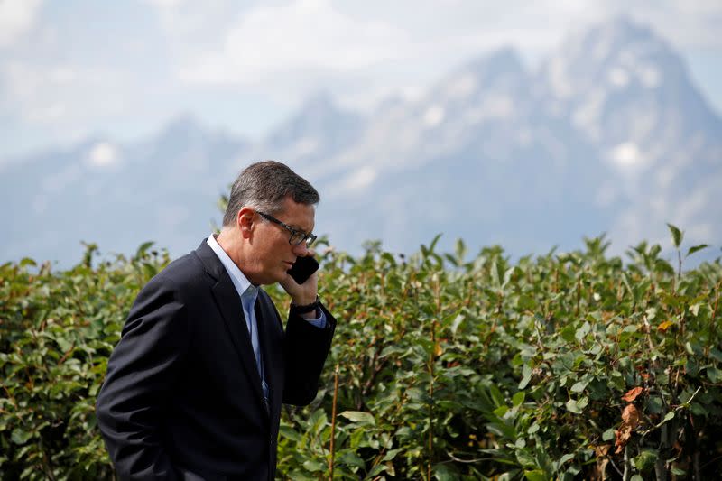 FILE PHOTO: Federal Reserve Vice Chair Richard Clarida talks on the phone during the three-day "Challenges for Monetary Policy" conference in Jackson Hole