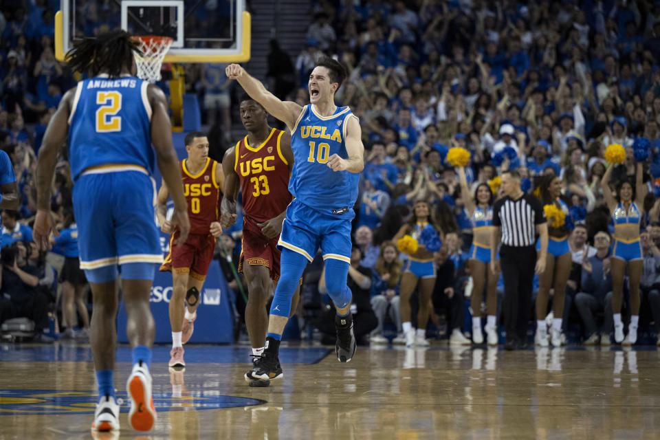 UCLA guard Lazar Stefanovic (10) reacts after scoring a basket during the first half of the team's NCAA college basketball game against Southern California, Saturday, Feb. 24, 2024 in Los Angeles. (AP Photo/Kyusung Gong)