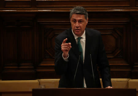 People's Party (PP) of Catalonia leader Xavier Garcia Albiol gives a speech during an investiture debate at the regional parliament in Barcelona, Spain, May 14, 2018. REUTERS/Albert Gea