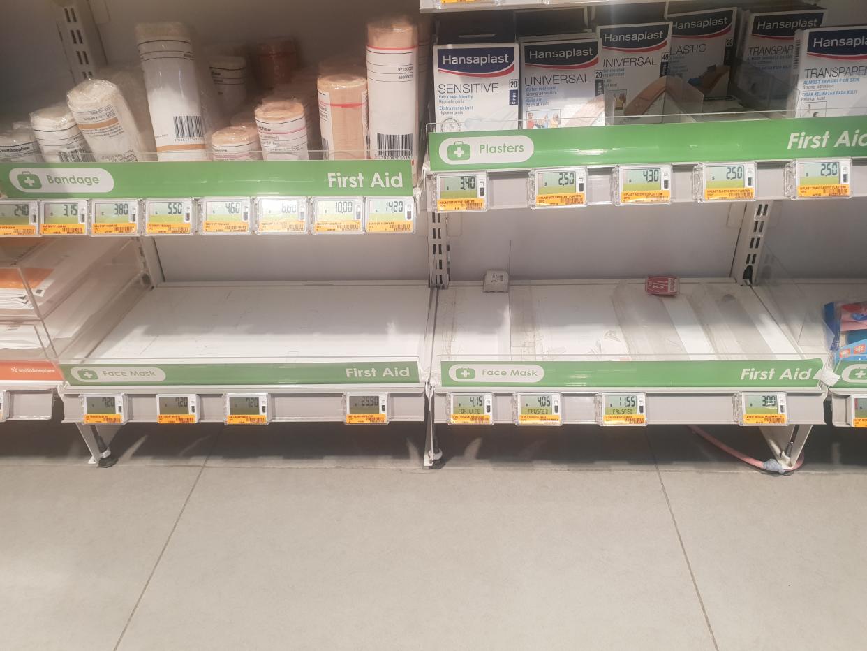 An empty shelf in Guardian which has run of face masks (Photo: Wan Ting Koh/Yahoo News Singapore)