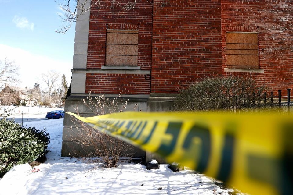 Police table at the abandoned Palmer Park Estates on Friday, Feb. 3, 2023. The bodies of Armani Kelly, 27, of Oscoda, Montoya Givens, 31, of Detroit; and Dante Wicker, 31, of Melvindale may have been found in the basement here. The three went missing on January 21st.