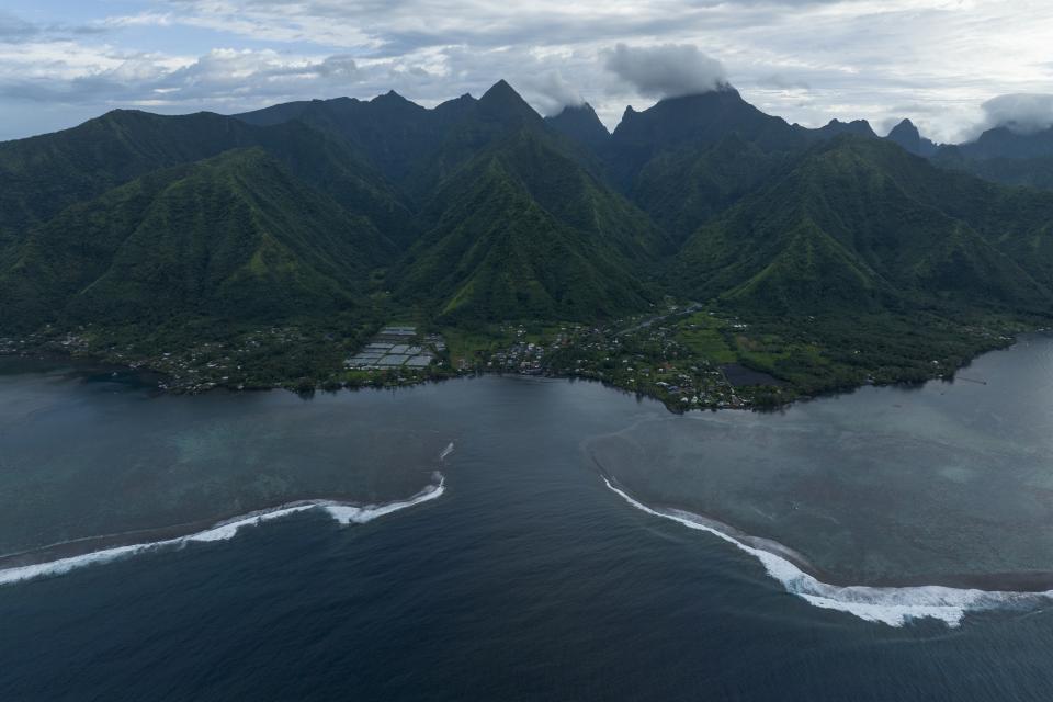 The surf breaks onto the lagoon in Teahupo'o, Tahiti, French Polynesia, Wednesday, Jan. 17, 2024. Teahupo'o will host the surfing competitions during the Olympic Games. (AP Photo/Daniel Cole)