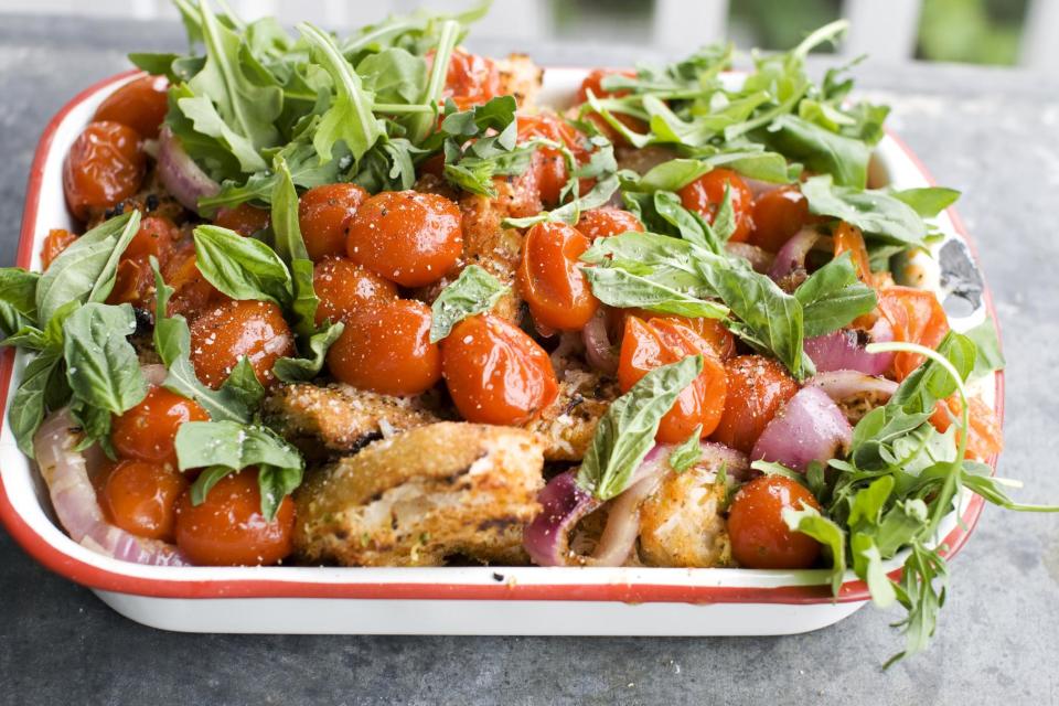 In this image taken on June 10, 2013, a grilled bread and tomato salad is shown in Concord, N.H. (AP Photo/Matthew Mead)