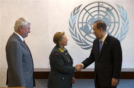 Major General Kristin Lund of Norway (C) meets with U.N. Secretary General Ban Ki-Moon (R) and UN Under-Secretary-General for Peacekeeping Operations Herve Ladsous (L) after Lund was appointed as the new Force Commander of the United Nations Peace Keeping Force in Cyprus at United Nations headquarters in New York, May 12, 2014. REUTERS/Mike Segar