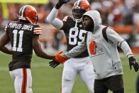 Cleveland Browns wide receiver Donovan Peoples-Jones (11) celebrates after an 11-yard touchdown with wide receiver Jarvis Landry during the first half of an NFL football game, Sunday, Oct. 17, 2021, in Cleveland. (AP Photo/Ron Schwane)