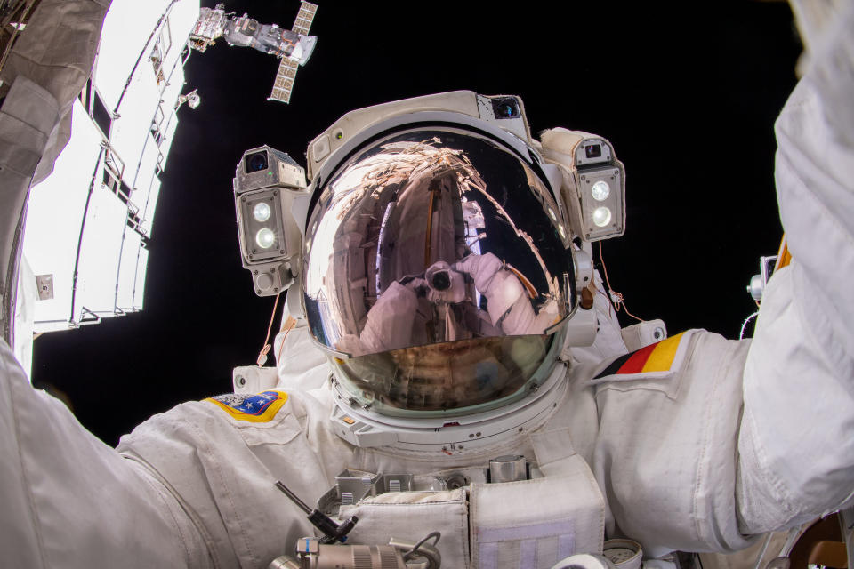ESA astronaut Matthias Maurer points the camera toward himself and takes a 