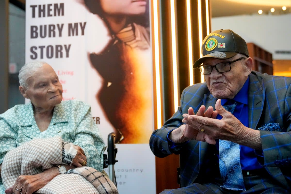 Tulsa race massacre survivors Viola Fletcher, left, and her younger brother Hughes Van Ellis, speak at an event on 16 June.  (AP)