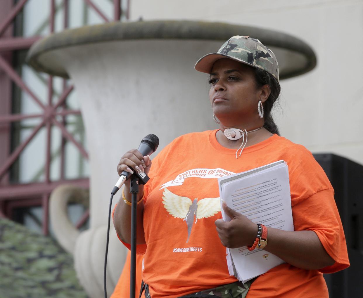 "That's a sad number when you get into triple digits," Malissa Thomas-St. Clair, leader and co-founder of Mothers of Murdered Columbus Children, said of Columbus reaching at least 100 homicides again in 2022. She is shown here speaking Aug. 1, 2021 during an anti-gun violence rally and march at Columbus City Hall.