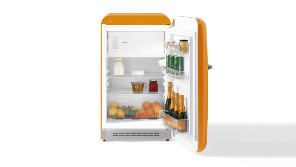 The inside of the small Smeg and Veuve Clicquot fridge