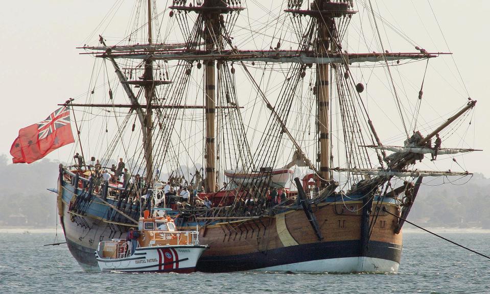 A replica of the Endeavour sits in the water