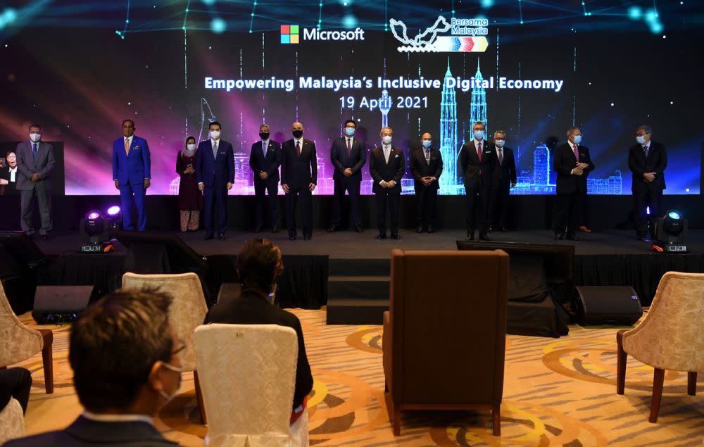 Prime Minister Tan Sri Muhyiddin Yassin (centre) attends the launch of Microsoft’s ‘Bersama Malaysia’ initiative in Putrajaya April 19, 2021. — Bernama pic